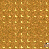 Optical microscope image of an X-ray mask with 6 &mu;m L- slits in 30 &mu;m thick gold.