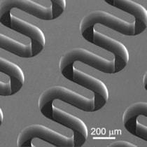 Scanning electron micrograph of solid copper folded waveguide circuits for a 220 GHz radar system.